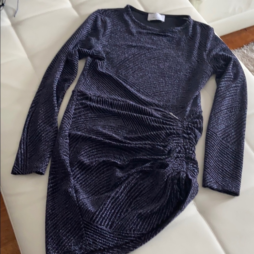 Elegant asymmetrical dress with ties on side.